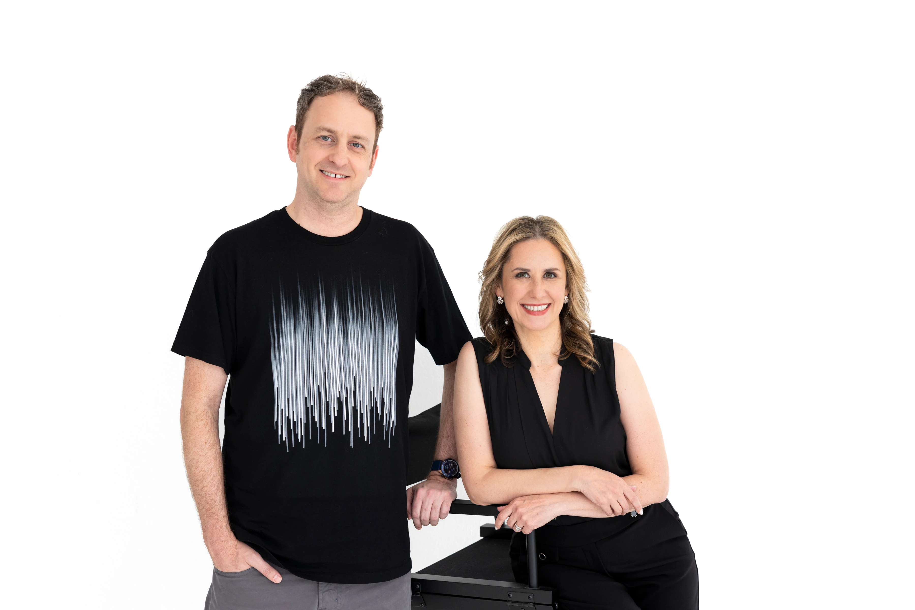 Daniel and Laressa Watlington together in a white studio